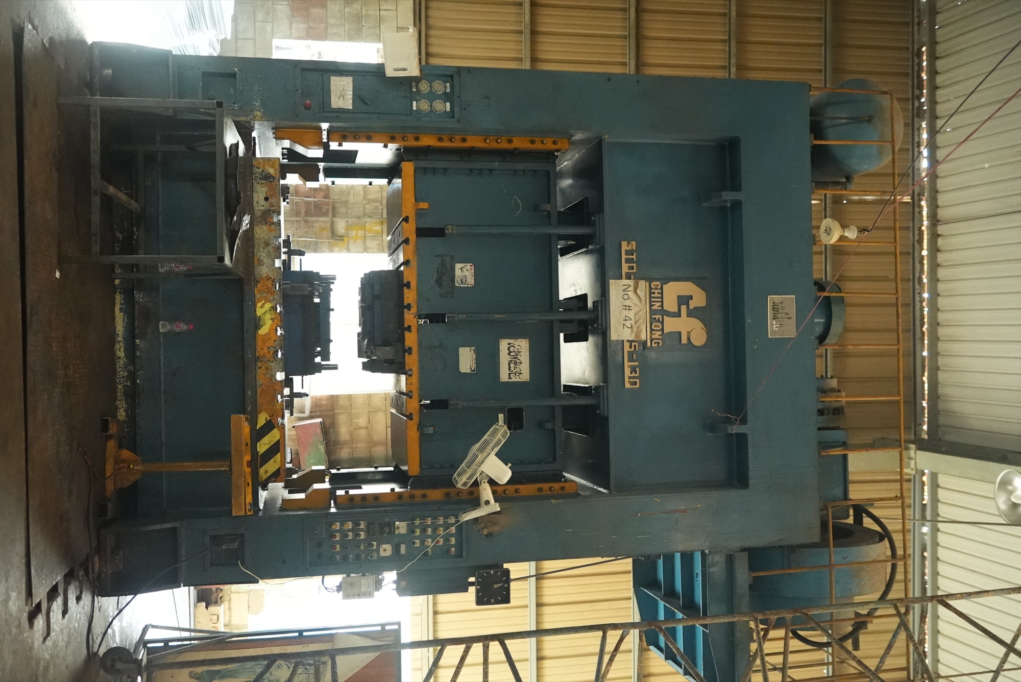 Chin Fong straight-side press, machine number 42, with a die set in the bed