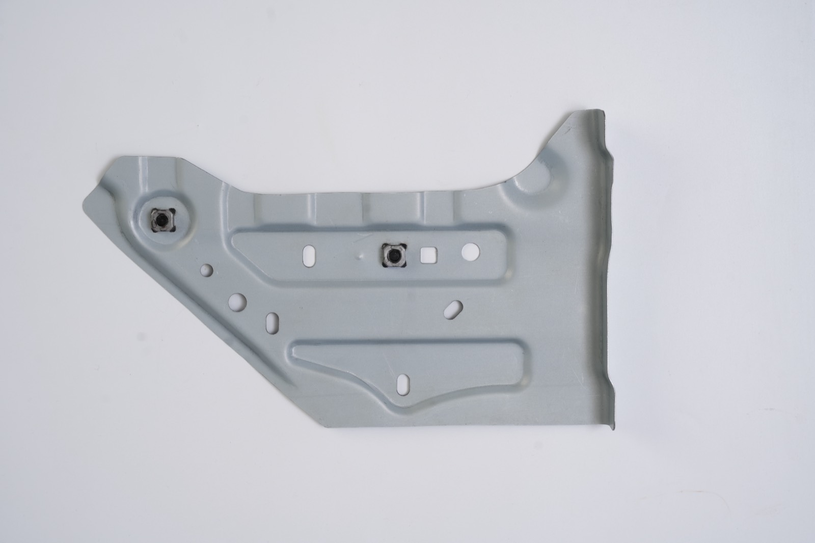 Formed sheet metal mounting panel with embossed ribs and projection-welded nuts