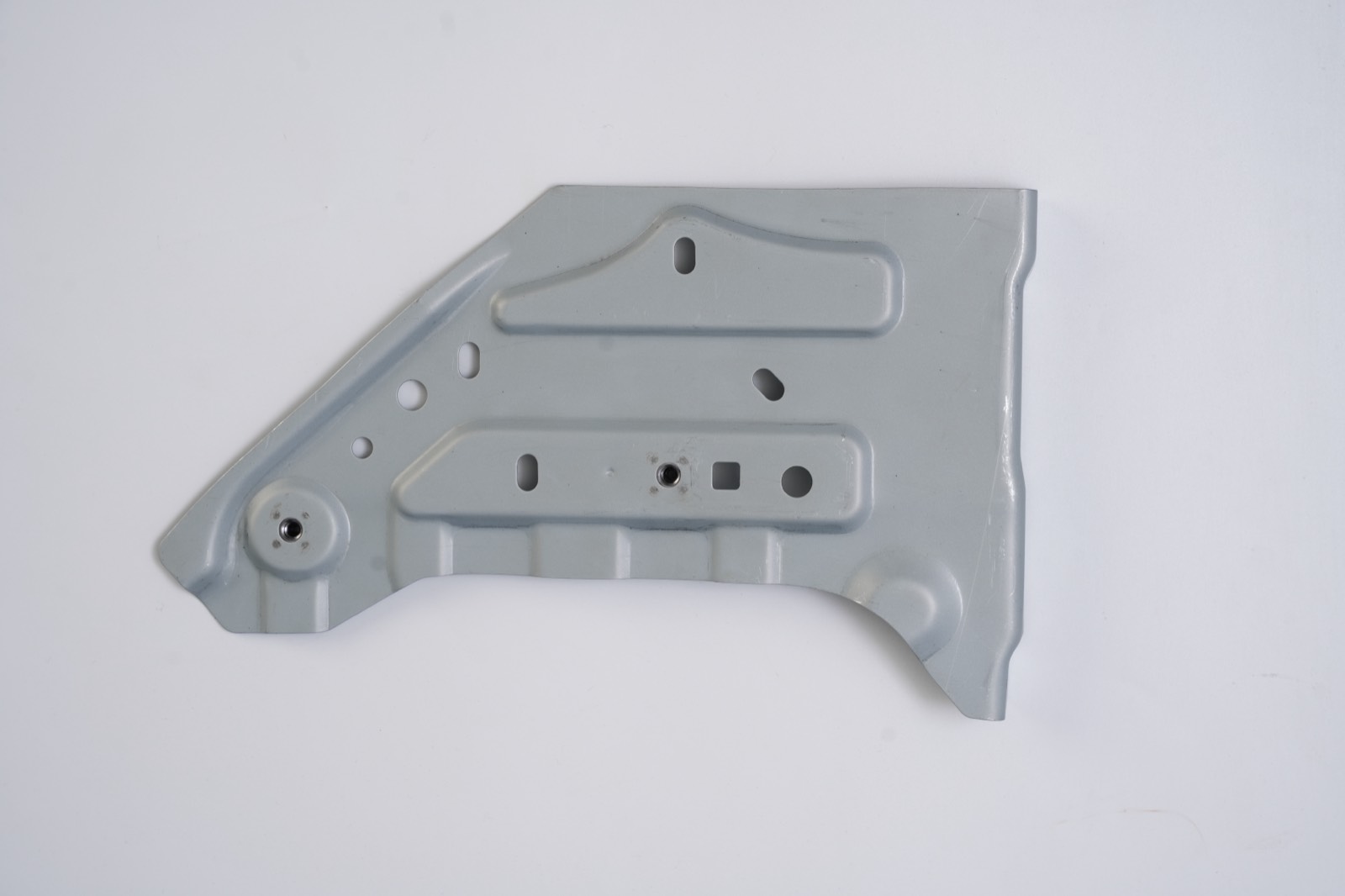 Sheet metal mounting panel, reverse side showing weld nut flanges