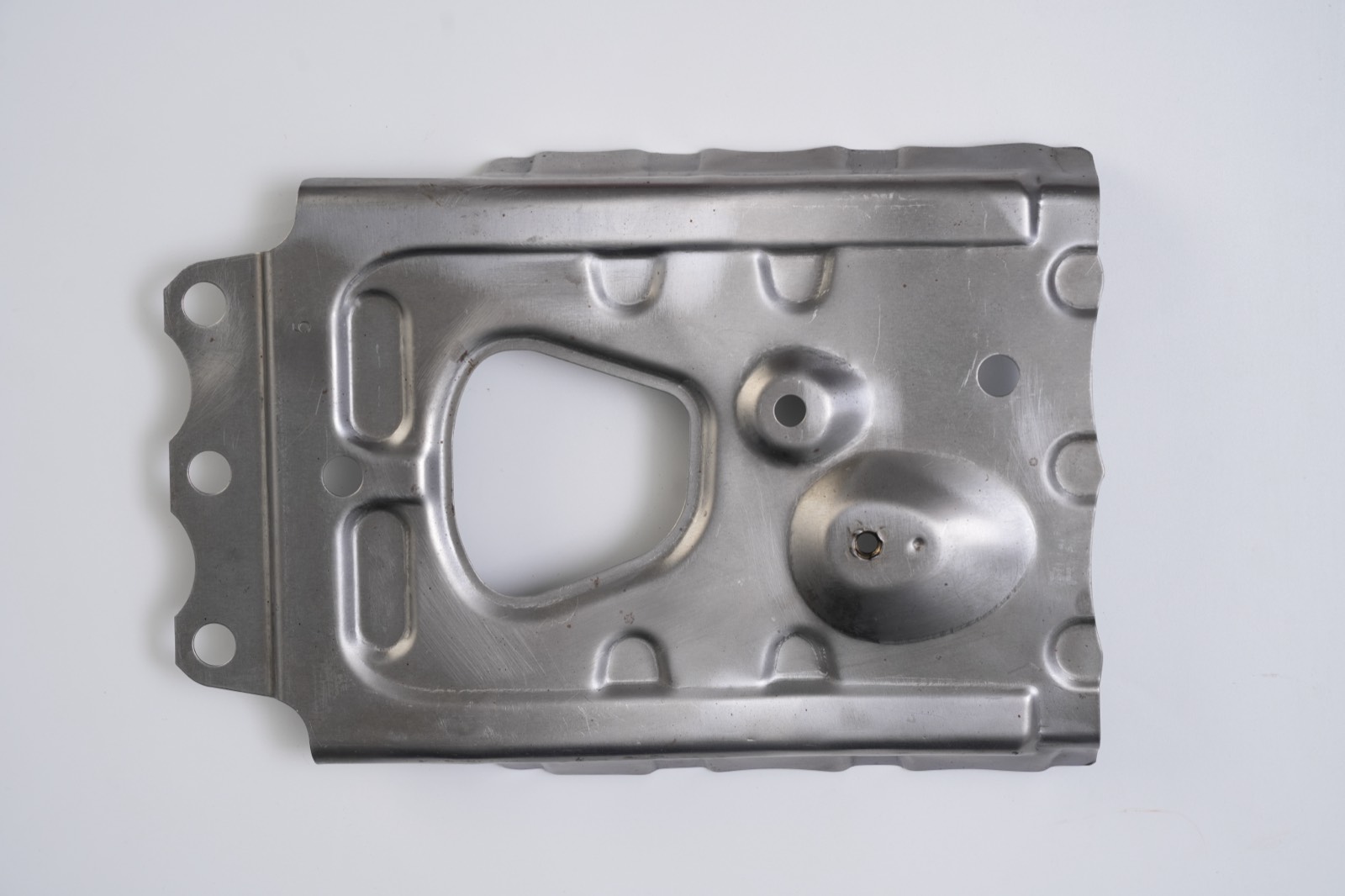 Ribbed support plate with flanged opening and embossed weld-nut boss