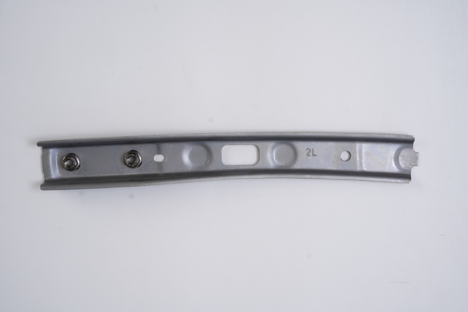 Formed channel strip with projection-welded hex nuts and embossed stiffeners