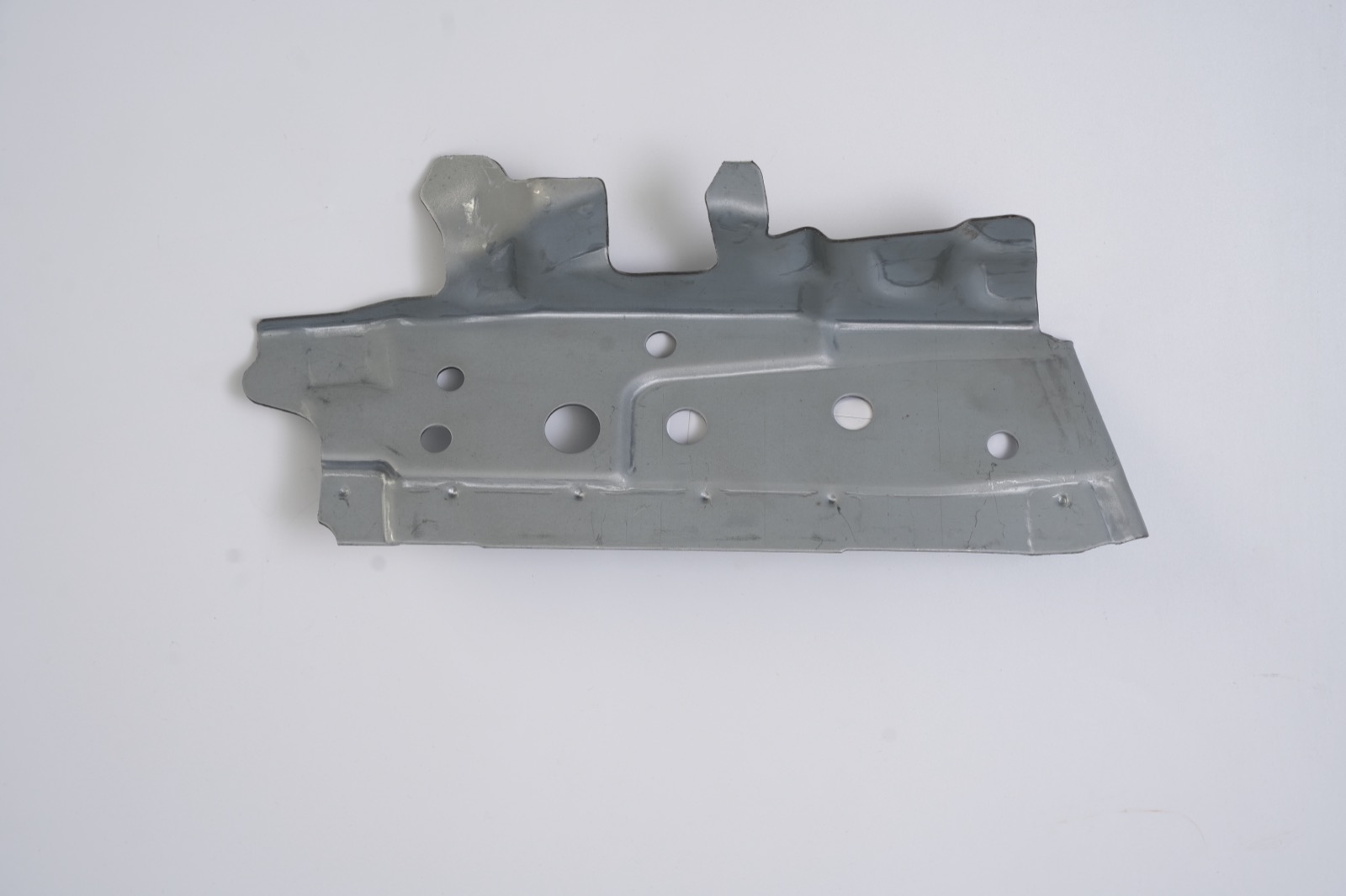 Sheet metal reinforcement panel, reverse side