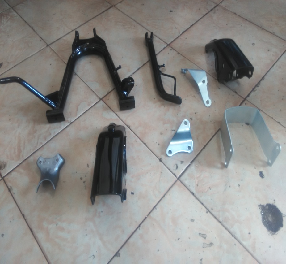 Stamped and welded bracket components, Yamaha programme